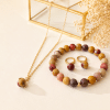 Ensemble bijoux en pierre naturelle de Mokaïte | Collier, bracelet et boucles d’oreilles