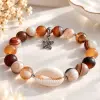 Bracelet mixte en agate du Botswana avec cauri