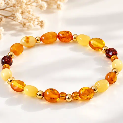 Bracelet extensible en ambre naturel de la mer Baltique et perles dorées