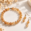 Ensemble bracelet extensible et boucles d’oreilles en citrine naturelle